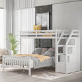 Houten hoogslaper voor een eenpersoonsbed boven een tweepersoonsbed, met trap, hoge veiligheidshekken en ladder