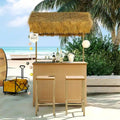 Set da esterno in stile hawaiano con tavolo alto da bar