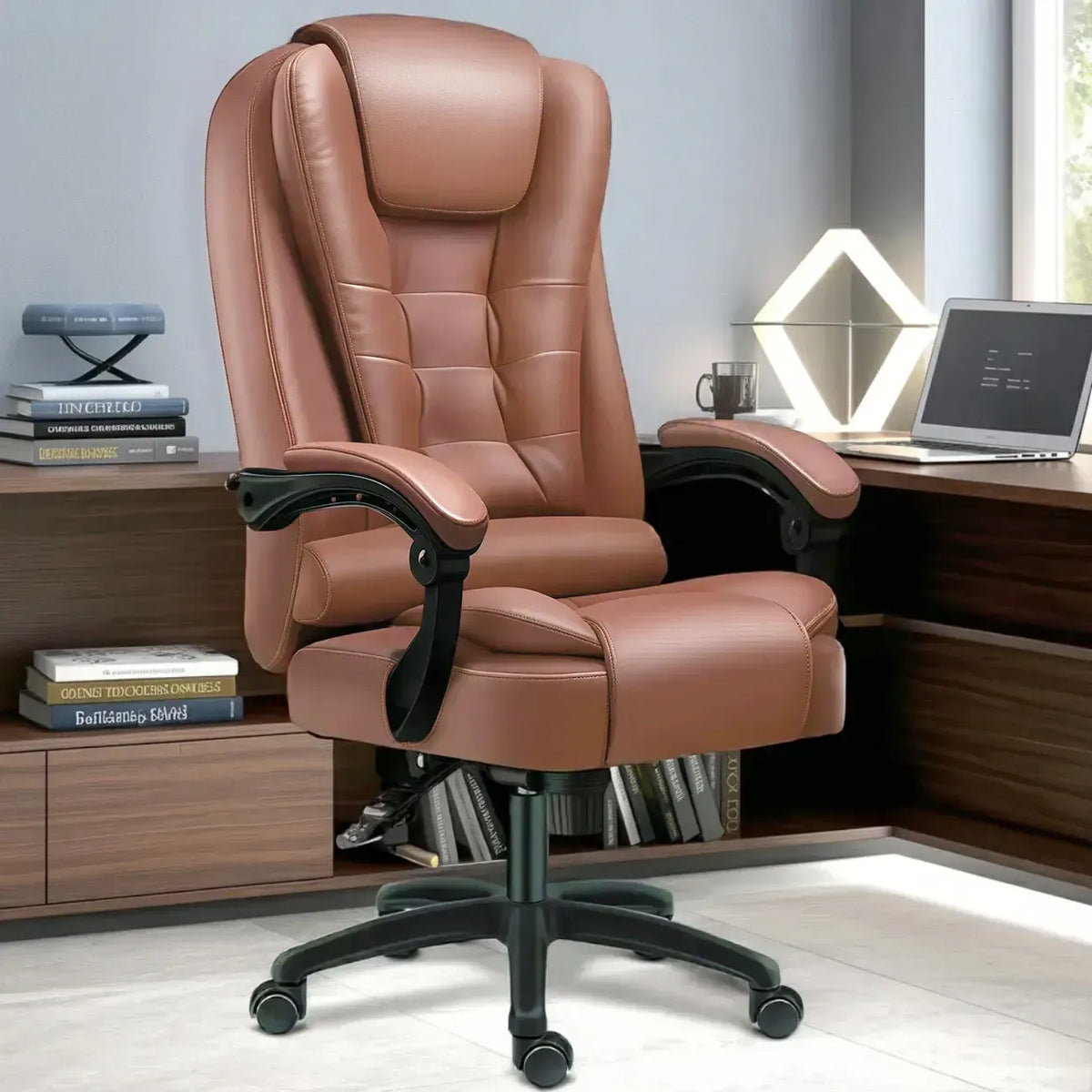 Sedia da ufficio ergonomica girevole in pelle nera con poggiapiedi