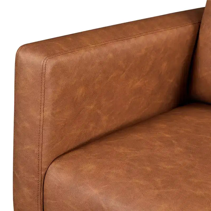 Sedia a dondolo rivestita in similpelle con gambe in legno di gomma marrone