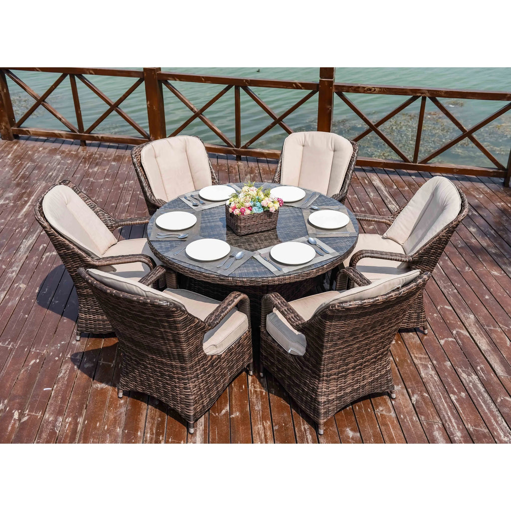 Set da pranzo rotondo da esterno in rattan intrecciato da 7 pezzi con cuscini di Moda Furnishings